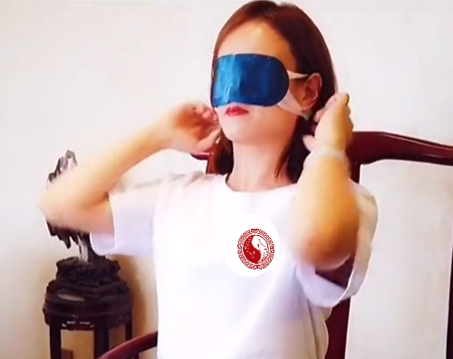 Steam Eye Mask in use