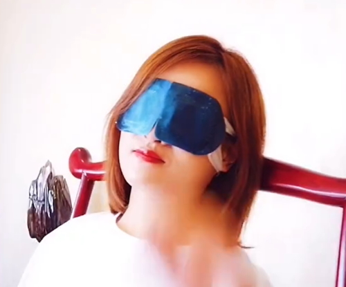 Steam Eye Mask in use